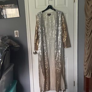 Beautiful sequence coat slits on the side great with a pair of jeans and shoes